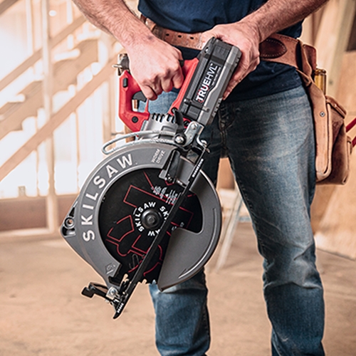 Skilsaw SPTH70M-01 in use, showing blade on left side for easy to see and track wood cutting.