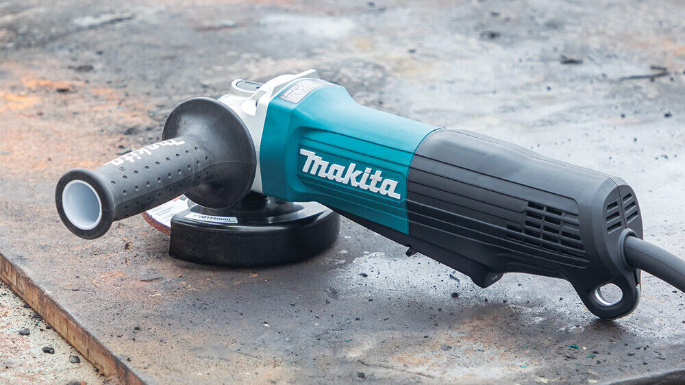 Makita angle grinder with paddle switch and non-removable guard